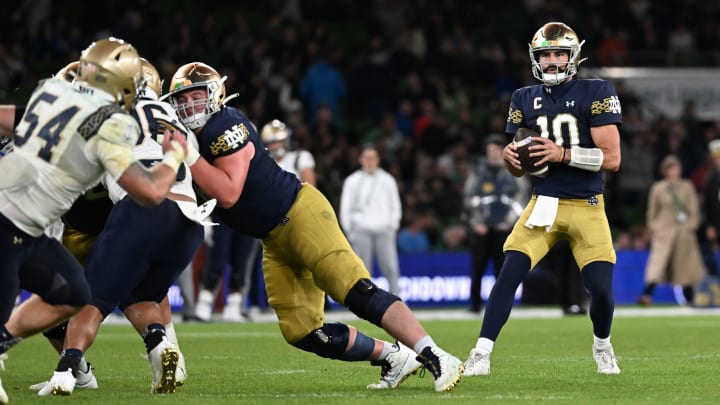 DUBLIN, IRELAND – AUGUST 26: Sam Hartman #10 of Notre Dame looks to pass during the Aer Lingus College Football Classic game between Notre Dame and Navy at Aviva Stadium on August 26, 2023 in Dublin, Ireland. (Photo by Charles McQuillan/Getty Images)