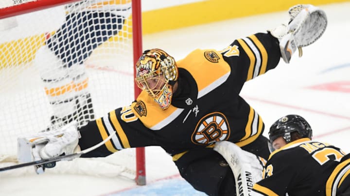 BOSTON, MA - NOVEMBER 21: Tuukka Rask #40 of the Boston Bruins reaches to catch the puck against the Buffalo Sabres at the TD Garden on November 21, 2019 in Boston, Massachusetts. (Photo by Steve Babineau/NHLI via Getty Images)
