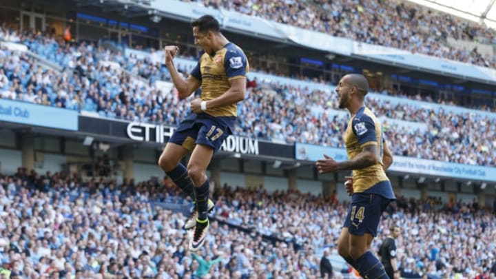 MANCHESTER, ENGLAND - MAY 08: Alexis Sanchez of Arsenal celebrates after scoring a goal to make it 2-2 during the Barclays Premier League match between Manchester City and Arsenal at the Ethiad Stadium on May 1, 2016 in Manchester, United Kingdom. (Photo by Matthew Ashton - AMA/Getty Images)