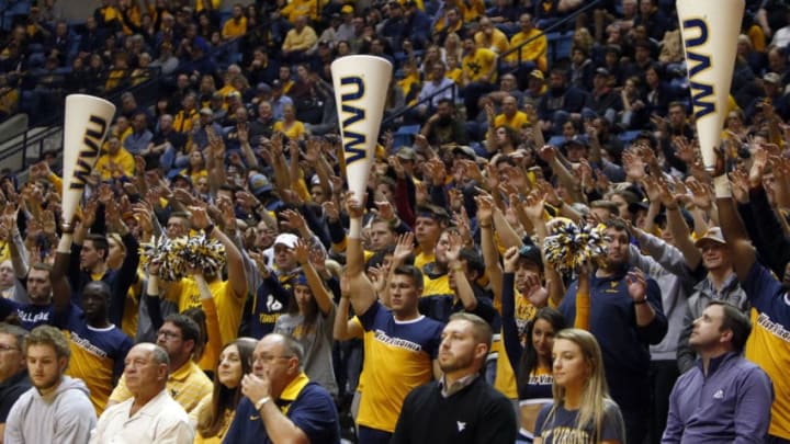 MORGANTOWN, WV - FEBRUARY 12: The West Virginia Mountaineers student section against the TCU Horned Frogs at the WVU Coliseum on February 12, 2018 in Morgantown, West Virginia. (Photo by Justin K. Aller/Getty Images)