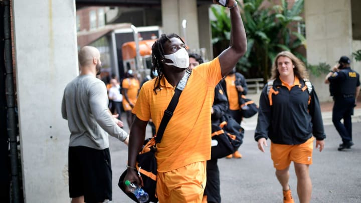 Tennessee linebacker Roman Harrison (30) waves to fans while arriving to the stadium before a game at Ben Hill Griffin Stadium in Gainesville, Fla. on Saturday, Sept. 25, 2021.Kns Tennessee Florida Football