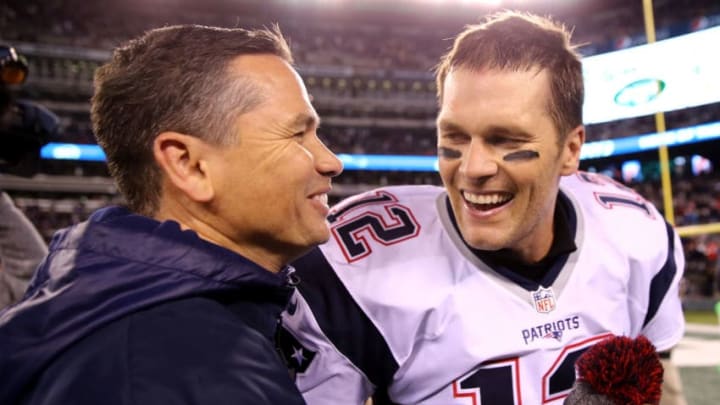 EAST RUTHERFORD, NJ - NOVEMBER 27: Tom Brady #12 of the New England Patriots celebrates with trainer Alex Guerrero after defeating the New York Jets with a score of 22 to 17 at MetLife Stadium on November 27, 2016 in East Rutherford, New Jersey. (Photo by Elsa/Getty Images)