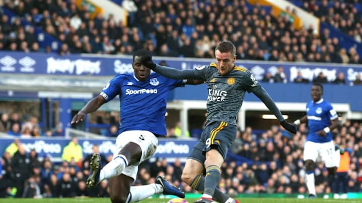 LIVERPOOL, ENGLAND - JANUARY 01: Jamie Vardy of Leicester City scores his sides first goal under pressure from Kurt Zouma of Everton during the Premier League match between Everton FC and Leicester City at Goodison Park on January 1, 2019 in Liverpool, United Kingdom. (Photo by Jan Kruger/Getty Images)