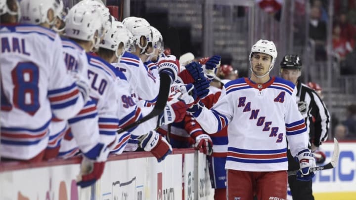 WASHINGTON, DC - FEBRUARY 24: Chris Kreider #20 of the New York Rangers celebrates after scoring a goal against the Washington Capitals in the first period at Capital One Arena on February 24, 2019 in Washington, DC. (Photo by Patrick McDermott/NHLI via Getty Images)