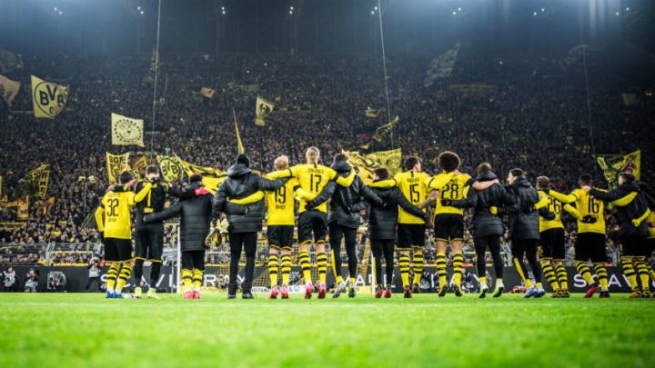 DORTMUND, GERMANY - JANUARY 24: (EDITORS NOTE: Image has been digitally enhanced.) Team of Dortmund celebrates his win with the fans after the Bundesliga match between Borussia Dortmund and 1. FC Köln at Signal Iduna Park on January 24, 2020 in Dortmund, Germany. (Photo by Lukas Schulze/Bundesliga/Bundesliga Collection via Getty Images)
