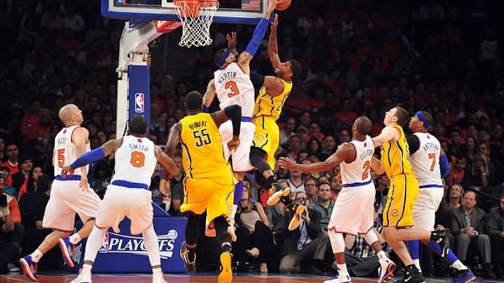 May 5, 2013; New York, NY, USA; New York Knicks power forward Kenyon Martin (3) blocks a shot by Indiana Pacers small forward Paul George (24) during the first half of game one of the second round of the NBA Playoffs. Pacers won the game 102-95. Mandatory Credit: Joe Camporeale-USA TODAY Sports