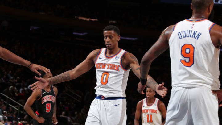 NEW YORK, NY - MARCH 19: Troy Williams #0 of the New York Knicks high fives teammates during the game against the Chicago Bulls on March 19, 2018 at Madison Square Garden in New York City, New York. NOTE TO USER: User expressly acknowledges and agrees that, by downloading and/or using this photograph, user is consenting to the terms and conditions of the Getty Images License Agreement. Mandatory Copyright Notice: Copyright 2018 NBAE (Photo by Nathaniel S. Butler/NBAE via Getty Images)