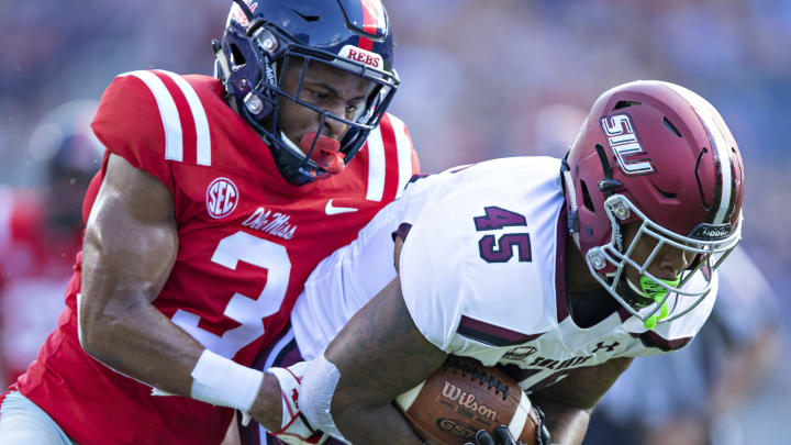 OXFORD, MS – SEPTEMBER 8: Jaylon Graham #45 of the Southern Illinois Salukis is tackled from behind after catching a pass against Vernon Dasher #3 of the Mississippi Rebels during the first half at Vaught-Hemingway Stadium on September 8, 2018 in Oxford, Mississippi. (Photo by Wesley Hitt/Getty Images)