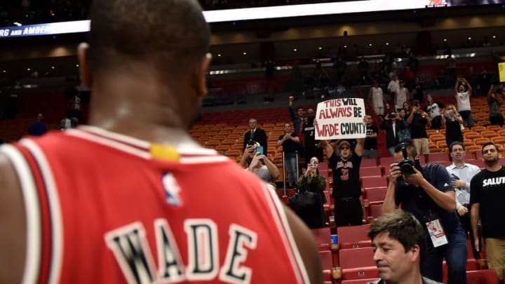 Nov 10, 2016; Miami, FL, USA; A fan displays a sign for Chicago Bulls guard Dwyane Wade (3) after a game against the Miami Heat at American Airlines Arena. The Bulls won 98-95. Mandatory Credit: Steve Mitchell-USA TODAY Sports