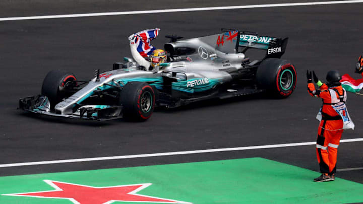 MEXICO CITY, MEXICO - OCTOBER 29: Lewis Hamilton of Great Britain and Mercedes GP celebrates after winning his fourth F1 World Drivers Championship after the Formula One Grand Prix of Mexico at Autodromo Hermanos Rodriguez on October 29, 2017 in Mexico City, Mexico. (Photo by Clive Rose/Getty Images)