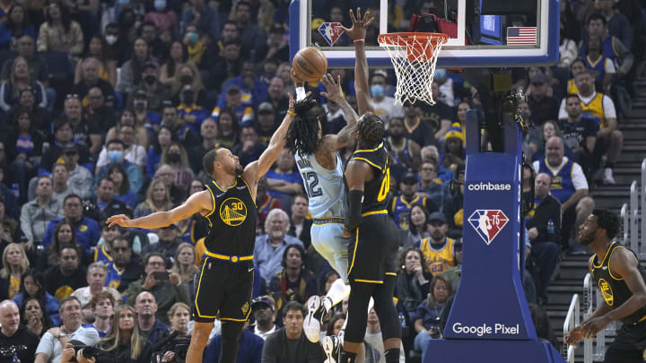 Golden State Warriors’ Stephen Curry and Jonathan Kuminga guard Ja Morant in the 2022 Western Conference Semifinals. (Photo by Thearon W. Henderson/Getty Images)