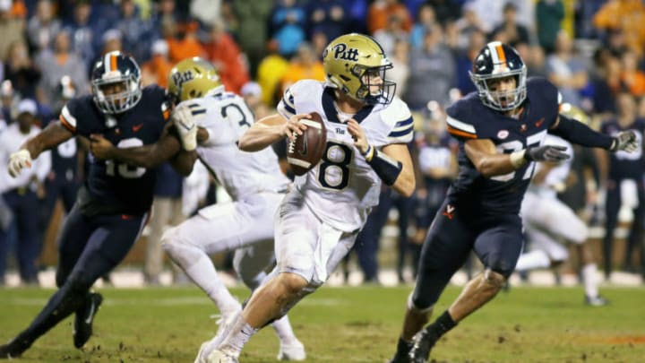 CHARLOTTESVILLE, VA - NOVEMBER 02: Kenny Pickett #8 of the Pittsburgh Panthers scrambles in the first half during a game against the Virginia Cavaliers at Scott Stadium on November 2, 2018 in Charlottesville, Virginia. (Photo by Ryan M. Kelly/Getty Images)