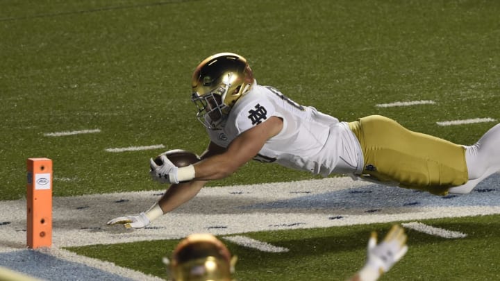 Nov 27, 2020; Chapel Hill, North Carolina, USA; Notre Dame Fighting Irish tight end George Takacs (85) dives just short of the pylon after a catch in the fourth quarter at Kenan Memorial Stadium. Mandatory Credit: Bob Donnan-USA TODAY Sports