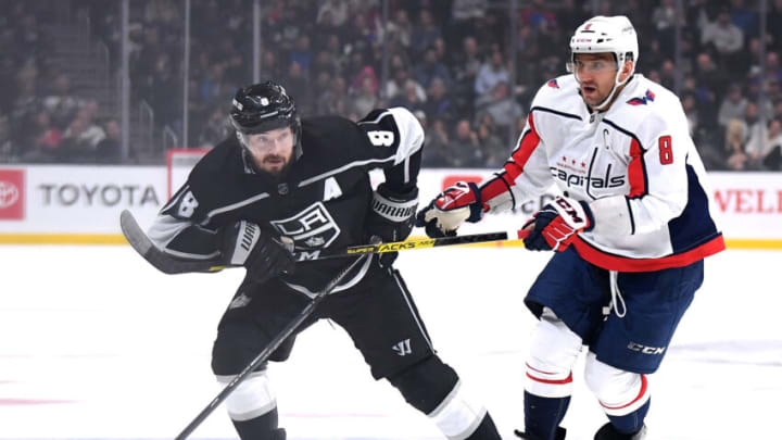 LOS ANGELES, CALIFORNIA - DECEMBER 04: Drew Doughty #8 of the Los Angeles Kings holds on to the stick of Alex Ovechkin #8 of the Washington Capitals during the second period at Staples Center on December 04, 2019 in Los Angeles, California. (Photo by Harry How/Getty Images)