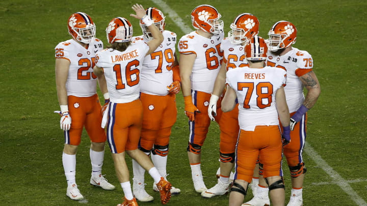 SANTA CLARA, CALIFORNIA – JANUARY 07: Trevor Lawrence #16 of the Clemson Tigers celebrates with teammates against the Alabama Crimson Tide during the fourth quarter in the College Football Playoff National Championship at Levi’s Stadium on January 07, 2019 in Santa Clara, California. (Photo by Lachlan Cunningham/Getty Images)