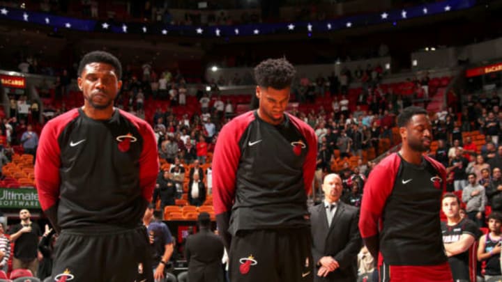 MIAMI, FL – NOVEMBER 30: Udonis Haslem #40, Hassan Whiteside #21 and Dwyane Wade #3 of the Miami Heat stand for the national anthem before the game against the New Orleans Pelicans on November 30, 2018 at American Airlines Arena in Miami, Florida. NOTE TO USER: User expressly acknowledges and agrees that, by downloading and or using this Photograph, user is consenting to the terms and conditions of the Getty Images License Agreement. Mandatory Copyright Notice: Copyright 2018 NBAE (Photo by Issac Baldizon/NBAE via Getty Images)