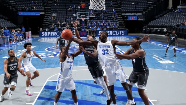MEMPHIS, TN - FEBRUARY 1: Moussa Cisse #32 of the Memphis Tigers grabs a rebound against the Central Florida Knights during a game on February 1, 2021 at FedExForum in Memphis, Tennessee. Memphis defeated Central Florida 96-69. (Photo by Joe Murphy/Getty Images)