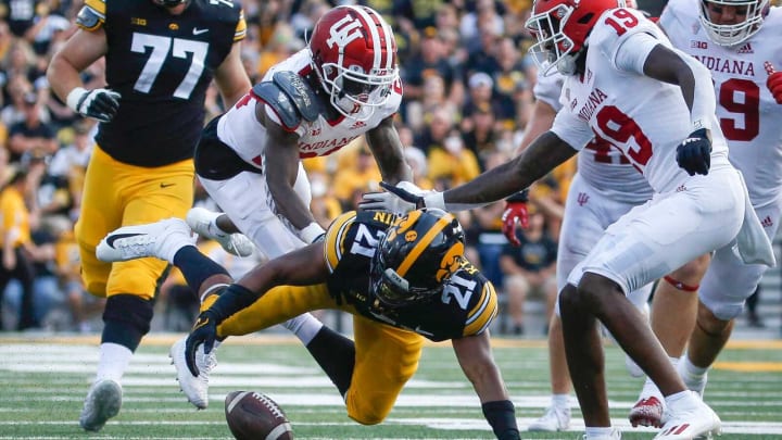 Iowa senior running back Ivory Kelly-Martin fumbles the ball in the fourth quarter against Indiana at Kinnick Stadium in Iowa City on Saturday, Sept. 4, 2021.20210904 Iowavsindiana