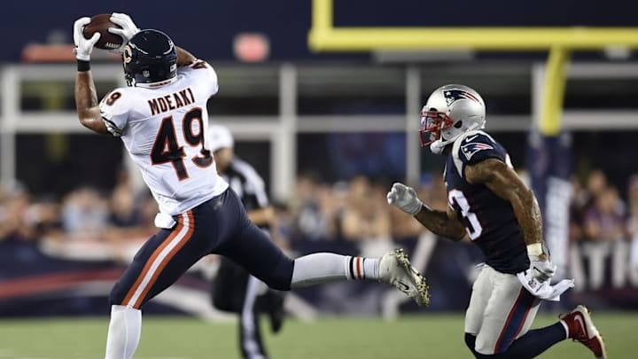 Aug 18, 2016; Foxborough, MA, USA; Chicago Bears tight end Tony Moeaki (49) makes a catch while being defended by New England Patriots strong safety Patrick Chung (23) during the first half at Gillette Stadium. Mandatory Credit: Bob DeChiara-USA TODAY Sports