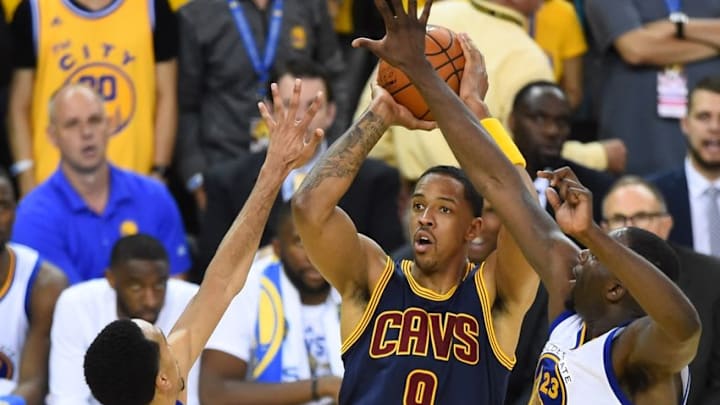 June 2, 2016; Oakland, CA, USA; Cleveland Cavaliers forward Channing Frye (9) shoots as Golden State Warriors guard Shaun Livingston (34) and forward Draymond Green (23) defend in the second half in game one of the NBA Finals at Oracle Arena. Mandatory Credit: Bob Donnan-USA TODAY Sports
