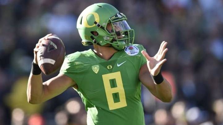 Jan 1, 2015; Pasadena, CA, USA; Oregon Ducks quarterback Marcus Mariota (8) passes against the Florida State Seminoles in the 2015 Rose Bowl college football game at Rose Bowl. Mandatory Credit: Kelvin Kuo-USA TODAY Sports