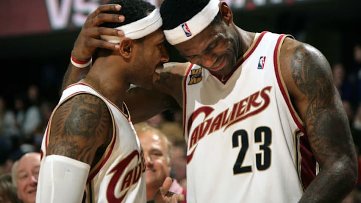 CLEVELAND - DECEMBER 30: Mo Williams #2 and LeBron James #23 of the Cleveland Cavaliers share a moment as their teammate Jamario Moon #15 extends their lead with a free throw in the final seconds of the game against the Atlanta Hawks on December 30, 2009 at The Quicken Loans Arena in Cleveland, Ohio. NOTE TO USER: User expressly acknowledges and agrees that, by downloading and/or using this Photograph, user is consenting to the terms and conditions of the Getty Images License Agreement. Mandatory Copyright Notice: Copyright 2009 NBAE (Photo by David Liam Kyle/NBAE via Getty Images)