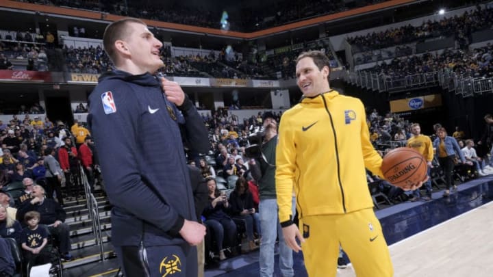 INDIANAPOLIS, IN - MARCH 24: Nikola Jokic #15 of the Denver Nuggets and Bojan Bogdanovic #44 of the Indiana Pacers talk prior to a game on March 24, 2019 at Bankers Life Fieldhouse in Indianapolis, Indiana. NOTE TO USER: User expressly acknowledges and agrees that, by downloading and or using this Photograph, user is consenting to the terms and conditions of the Getty Images License Agreement. Mandatory Copyright Notice: Copyright 2019 NBAE (Photo by Ron Hoskins/NBAE via Getty Images)