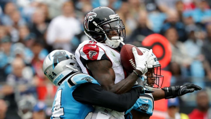 CHARLOTTE, NC - NOVEMBER 05: Julio Jones #11 of the Atlanta Falcons runs the ball against James Bradberry #24 of the Carolina Panthers in the second quarter during their game at Bank of America Stadium on November 5, 2017 in Charlotte, North Carolina. (Photo by Streeter Lecka/Getty Images)