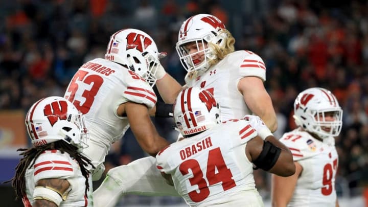 MIAMI GARDENS, FL - DECEMBER 30: Andrew Van Ginkel #17 of the Wisconsin Badgers celebrates an interception during the 2017 Capital One Orange Bowl against the Miami Hurricanes at Hard Rock Stadium on December 30, 2017 in Miami Gardens, Florida. (Photo by Mike Ehrmann/Getty Images)