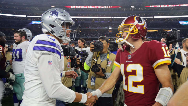 ARLINGTON, TEXAS – NOVEMBER 22: Dak Prescott #4 of the Dallas Cowboys shakes hands with Colt McCoy #12 of the Washington Redskins after the game at AT&T Stadium on November 22, 2018 in Arlington, Texas. (Photo by Richard Rodriguez/Getty Images)
