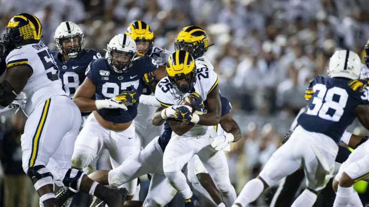 UNIVERSITY PARK, PA – OCTOBER 19: Hassan Haskins #25 of the Michigan Wolverines carries the ball for a first down during the second quarter against the Penn State Nittany Lions on October 19, 2019 at Beaver Stadium in University Park, Pennsylvania. (Photo by Brett Carlsen/Getty Images)