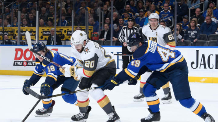 ST. LOUIS, MO – DECEMBER 12: Chandler Stephenson #20 of the Vegas Golden Knights defends against Robert Thomas #18 and Ivan Barbashev #49 of the St. Louis Blues at Enterprise Center on December 12, 2019 in St. Louis, Missouri. (Photo by Scott Rovak/NHLI via Getty Images)