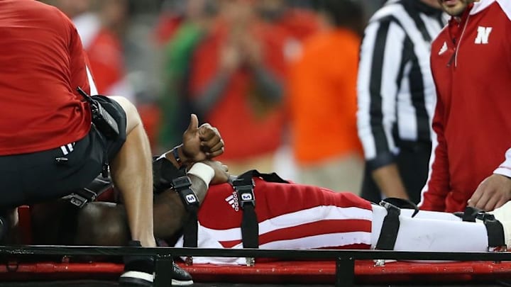 Nov 5, 2016; Columbus, OH, USA; Nebraska Cornhuskers quarterback Tommy Armstrong Jr. (4) gives the thumbs up while being carted off the field during the second quarter at Ohio Stadium. Ohio State Buckeyes lead 31-3 at half. Mandatory Credit: Joe Maiorana-USA TODAY Sports