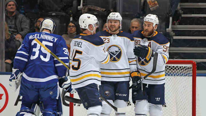 TORONTO, ON - APRIL 2: Sam Reinhart #23 of the Buffalo Sabres celebrates a goal with teammates Jack Eichel #15 and Ryan O'Reilly #90 against the Toronto Maple Leafs during an NHL game at the Air Canada Centre on April 2, 2018 in Toronto, Ontario, Canada. (Photo by Claus Andersen/Getty Images)
