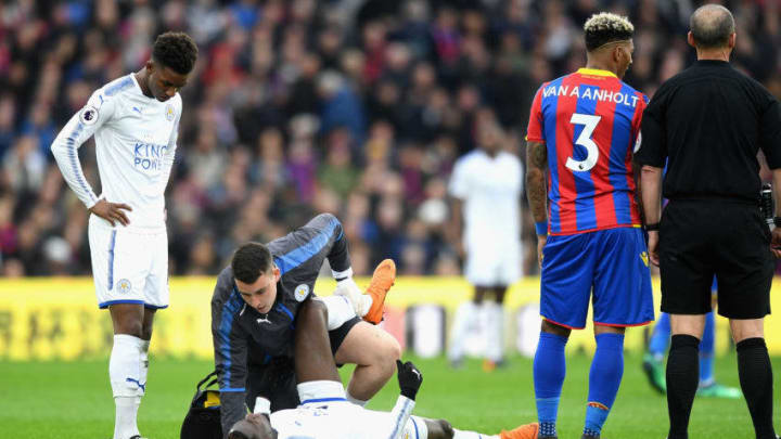 LONDON, ENGLAND - APRIL 28: Wilfred Ndidi of Leicester City is given treatment due to an injury during the Premier League match between Crystal Palace and Leicester City at Selhurst Park on April 28, 2018 in London, England. (Photo by Michael Regan/Getty Images)