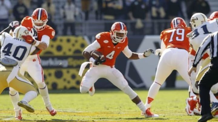 Nov 15, 2014; Atlanta, GA, USA; Clemson Tigers quarterback Deshaun Watson (4) runs with the ball against the Georgia Tech Yellow Jackets in the first quarter at Bobby Dodd Stadium. Mandatory Credit: Brett Davis-USA TODAY Sports