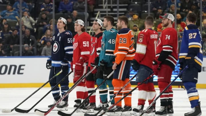 ST LOUIS, MISSOURI - JANUARY 24: Mark Scheifele #55 of the Winnipeg Jets, Tyler Bertuzzi #59 of the Detroit Red Wings, Nico Hischier #13 of the New Jersey Devils, Tomas Hertl #48 of the San Jose Sharks, Leon Draisaitl #29 of the Edmonton Oilers, Jonathan Huberdeau #11 of the Florida Panthers Jaccob Slavin #74 of the Carolina Hurricanes and Alex Pietrangelo #27 of the St. Louis Blues take part in the 2020 NHL All-Star Skills competition at Enterprise Center on January 24, 2020 in St Louis, Missouri. (Photo by Patrick McDermott/NHLI via Getty Images)