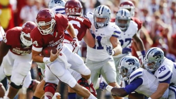 An errant throw from Trevor Knight on Oklahoma's own 1-yard line led to an easy interception and return for a touchdown for Kansas State, giving them a 14-7 lead. Mandatory Credit: Kevin Jairaj-USA TODAY Sports An errant throw from Trevor Knight on Oklahoma's own 1-yard line led to an easy interception and return for a touchdown for Kansas State, giving them a 14-7 lead. Mandatory Credit: Kevin Jairaj-USA TODAY Sports