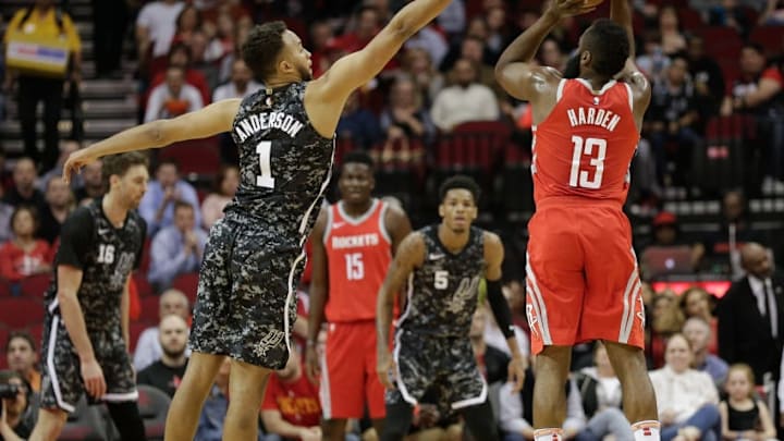 HOUSTON, TX - MARCH 12: James Harden #13 of the Houston Rockets shoots a three point basket over Kyle Anderson #1 of the San Antonio Spurs at Toyota Center on March 12, 2018 in Houston, Texas. (Photo by Bob Levey/Getty Images)