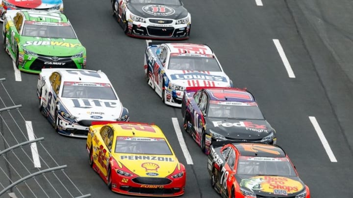 May 29, 2016; Concord, NC, USA; Pole winner Sprint Cup Series driver Martin Truex Jr. (78) and driver Joey Logano (22) lead the pack to start the Coca-Cola 600 at Charlotte Motor Speedway. Mandatory Credit: Jim Dedmon-USA TODAY Sports May 29, 2016; Concord, NC, USA; Pole winner Sprint Cup Series driver Martin Truex Jr. (78) and driver Joey Logano (22) lead the pack to start the Coca-Cola 600 at Charlotte Motor Speedway. Mandatory Credit: Jim Dedmon-USA TODAY Sports