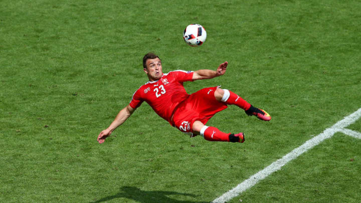 SAINT-ETIENNE, FRANCE - JUNE 25: Xherdan Shaqiri of Switzerland scores his team's first goal during the UEFA EURO 2016 round of 16 match between Switzerland and Poland at Stade Geoffroy-Guichard on June 25, 2016 in Saint-Etienne, France. (Photo by Alex Livesey/Getty Images)