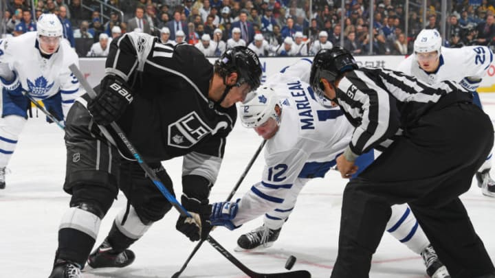 LOS ANGELES, CA - NOVEMBER 02: Anze Kopitar #11 of the Los Angeles Kings faces off against Patrick Marleau #12 of the Toronto Maple Leafs at STAPLES Center on November 2, 2017 in Los Angeles, California. (Photo by Aaron Poole/NHLI via Getty Images)