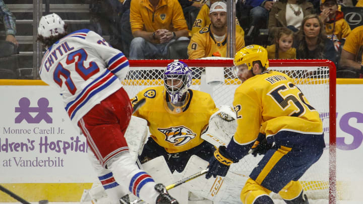 NASHVILLE, TENNESSEE – NOVEMBER 02: Filip Chytil #72 of the New York Rangers scores a goal against goalie Juuse Saros #74 of the Nashville Predators during the first period at Bridgestone Arena on November 02, 2019 in Nashville, Tennessee. (Photo by Frederick Breedon/Getty Images)
