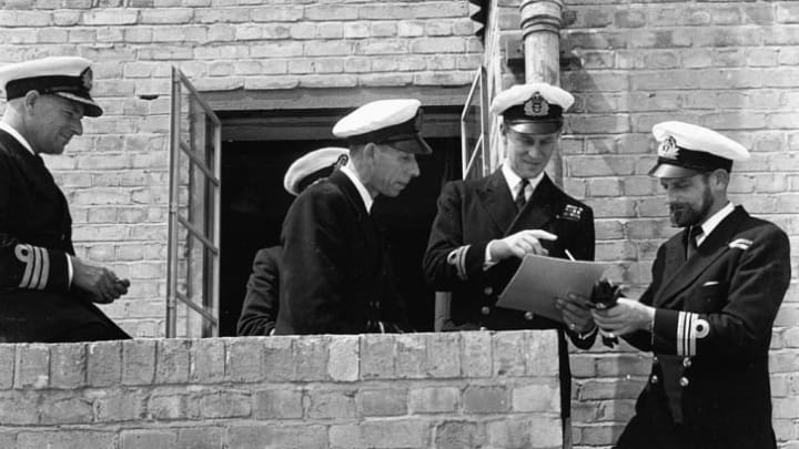 Lieutenant Philip Mountbatten, prior to his marriage to Princess Elizabeth, talking to a group of Naval officers on his return to Royal Navy duties, at the Petty Officers Training Centre in Corsham, Wiltshire, July 31st 1947