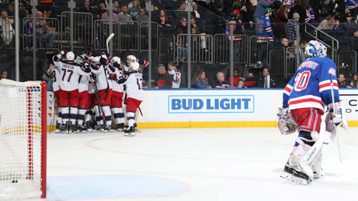 NEW YORK, NY - DECEMBER 27: The Columbus Blue Jackets celebrate an overtime win against Henrik Lundqvist #30 and the New York Rangers at Madison Square Garden on December 27, 2018 in New York City. (Photo by Jared Silber/NHLI via Getty Images)