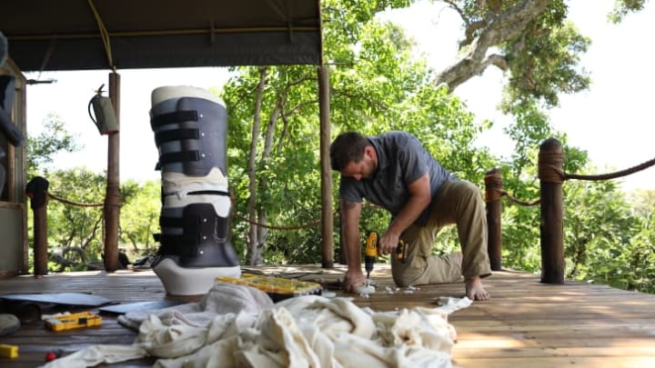 Derrick Campana builds a custom leg brace for Jabu the elephant.