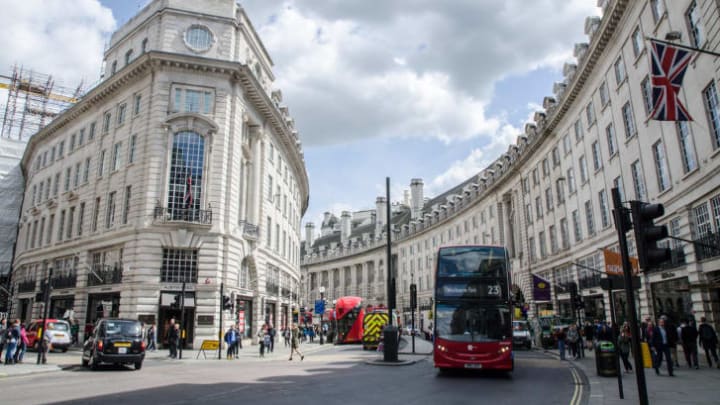 People, cars and double-decker bus passing by London's Regent Street
