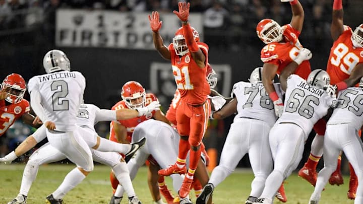 The Kansas City Chiefs' Eric Murray (21) blocks a field goal attempt by Oakland Raiders kicker Giorgio Tavecchio (2) in the second quarter at the Coliseum in Oakland, Calif., on Thursday, Oct. 19, 2017. (John Sleezer/Kansas City Star/TNS via Getty Images)