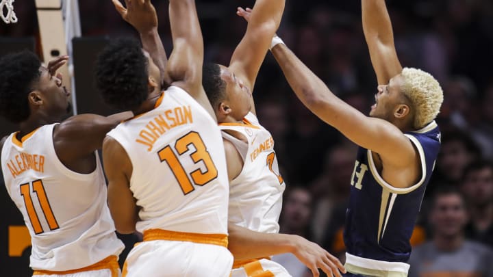 KNOXVILLE, TN – NOVEMBER 13: Brandon Alston #4 of the Georgia Tech Yellow Jackets shoots the ball with Kyle Alexander #11, Jalen Johnson #13 and Grant Williams #2 of the Tennessee Volunteers defending at Thompson-Boling Arena on November 13, 2018 in Knoxville, Tennessee. (Photo by Donald Page/Getty Images)