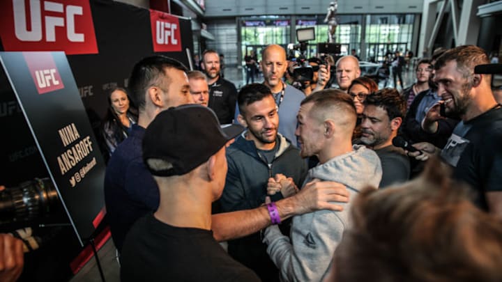 Pedro Munhoz and Petr Yan exchange words at the UFC 238 Media Day (photo by Amy Kaplan/FanSided)
